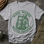 T-Shirt — "Older. Wilder. Better Equipped." Adventure Backpack Graphic